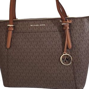 MK med sizes Brown MK monogram tote. ❤️SOLD❤️